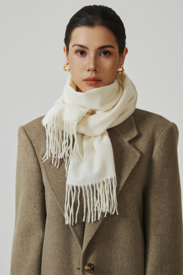 Margo & Main - ivory white lamb wool scarf for women knotted over a green coat, one size