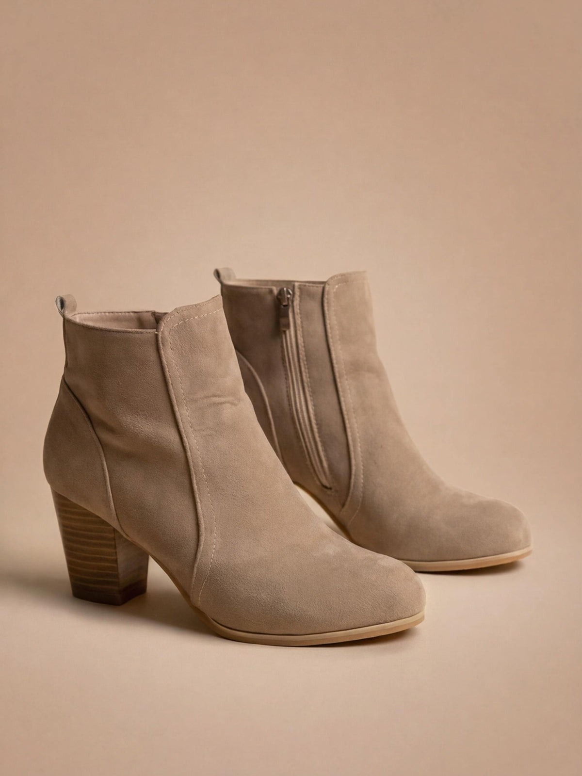 Margo & Main – Beige suede block heel ankle boots angled pair view, US women's sizes