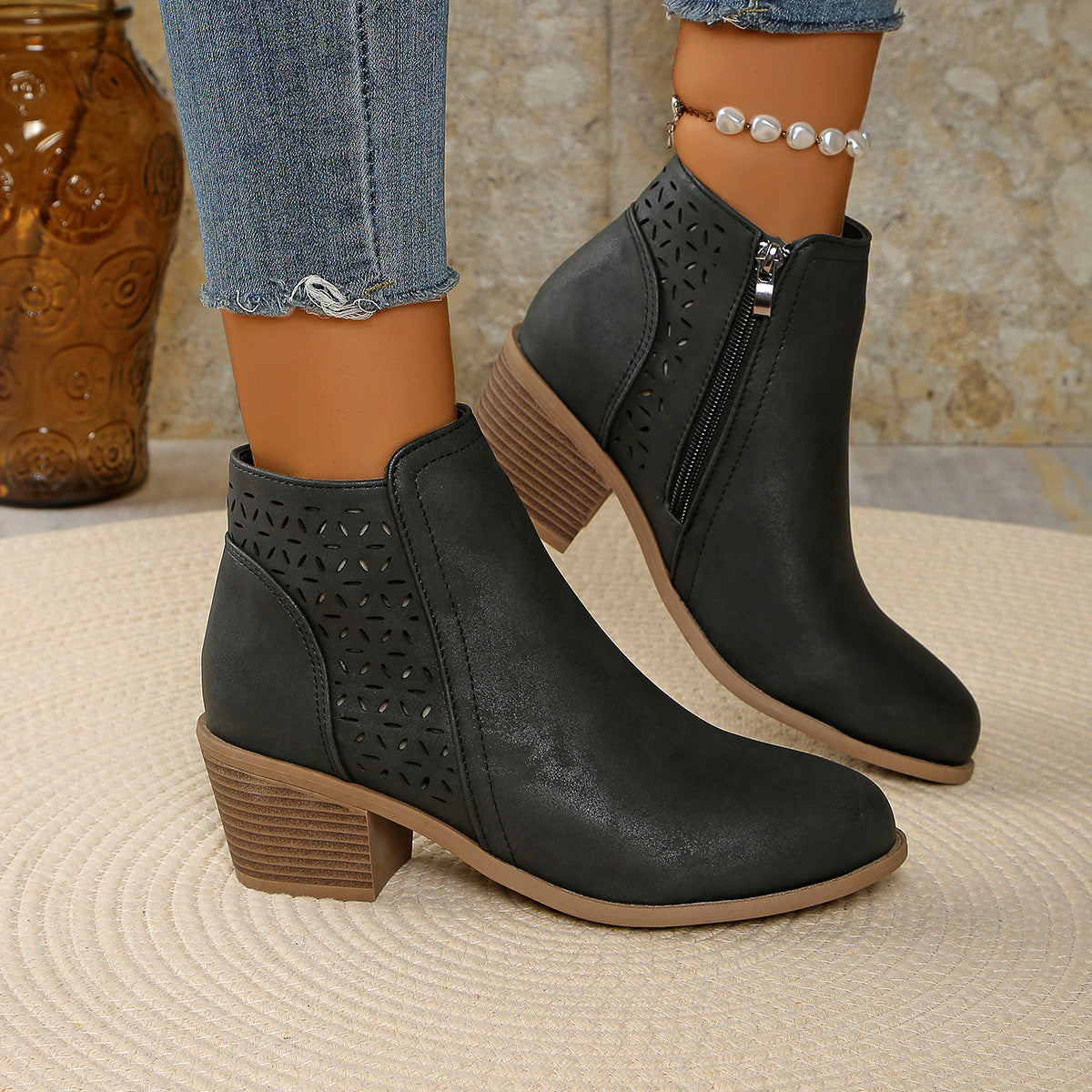 Margo & Main – black cutout ankle boot side profile worn with cropped jeans, US women’s sizes