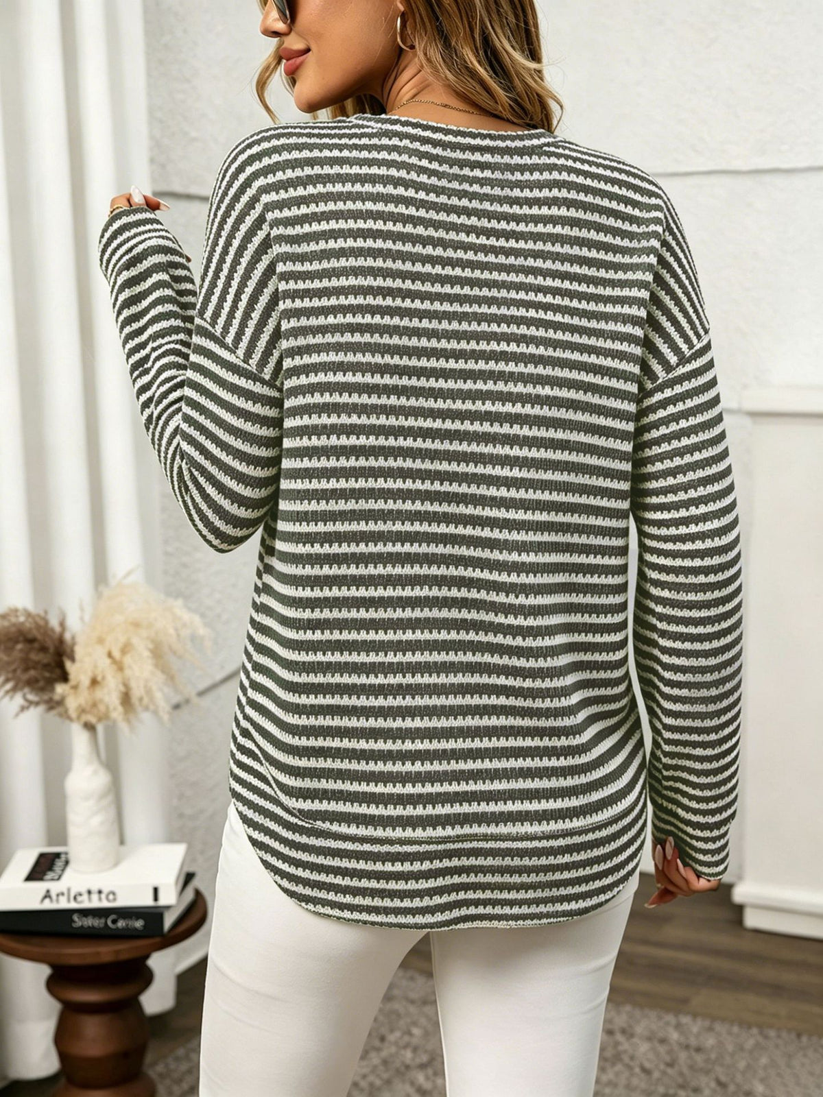 Margo & Main – Alvina olive green striped waffle-knit crewneck long sleeve top, back view with the curved hem, US women's sizes