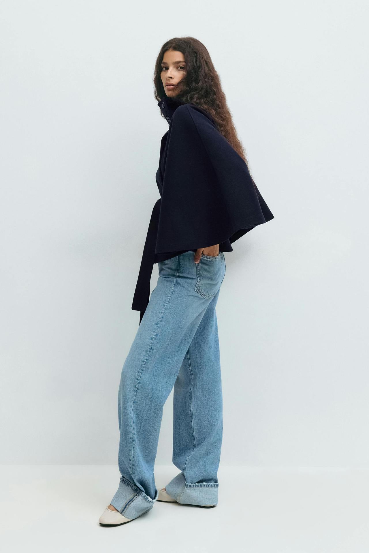 Margo & Main – Anneke navy button-front belted cape coat, side view showing the cape drape, US women's sizes