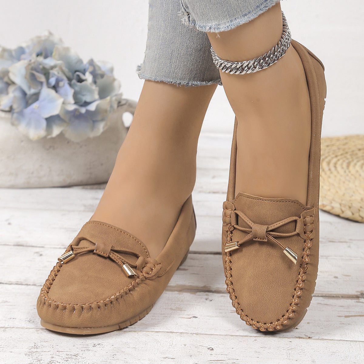Margo & Main – camel moccasin loafers worn seated, bow and vamp close-up, US women's sizes