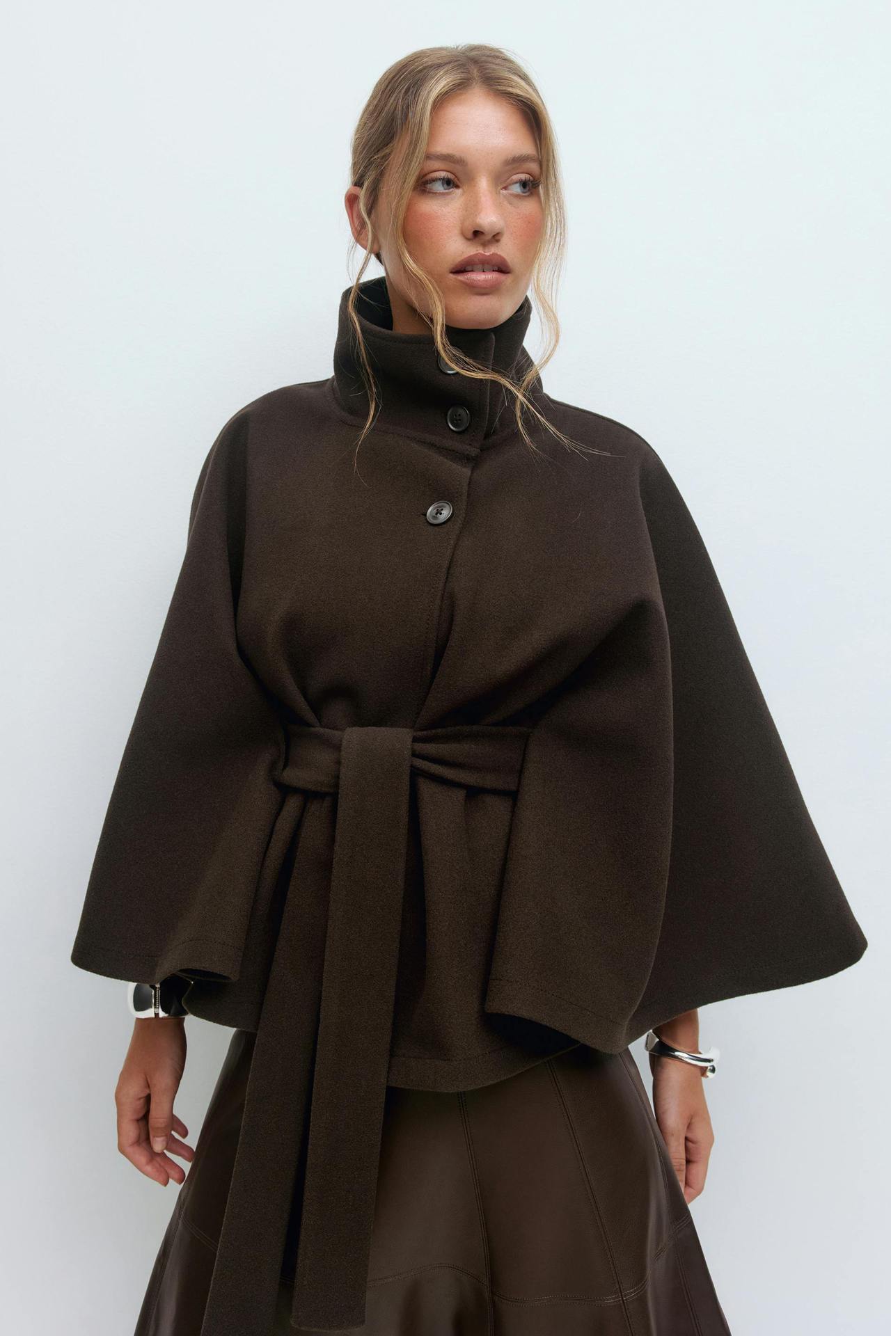Margo & Main – Anneke chocolate brown button-front belted cape coat, waist-up front view with the belt tied, US women's sizes