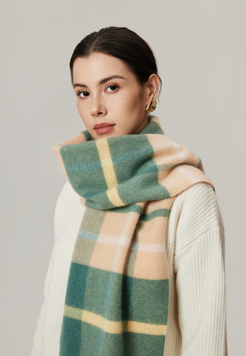 Margo & Main green brushed plaid wool scarf — close-up of the green and peach block check