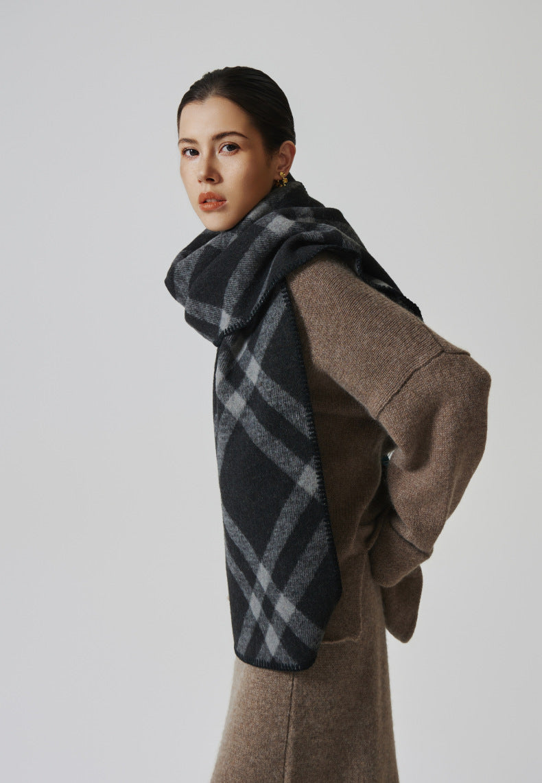 Margo & Main black check scarf — side view wrapped over a camel knit, long ends draped