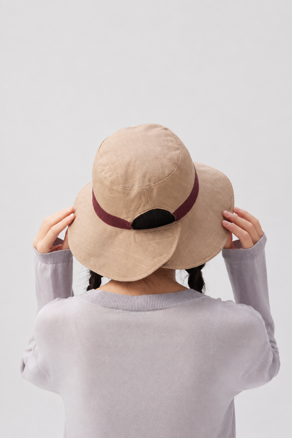 Margo & Main – Sabella tan side of the reversible sun hat from the back, burgundy band and split brim visible