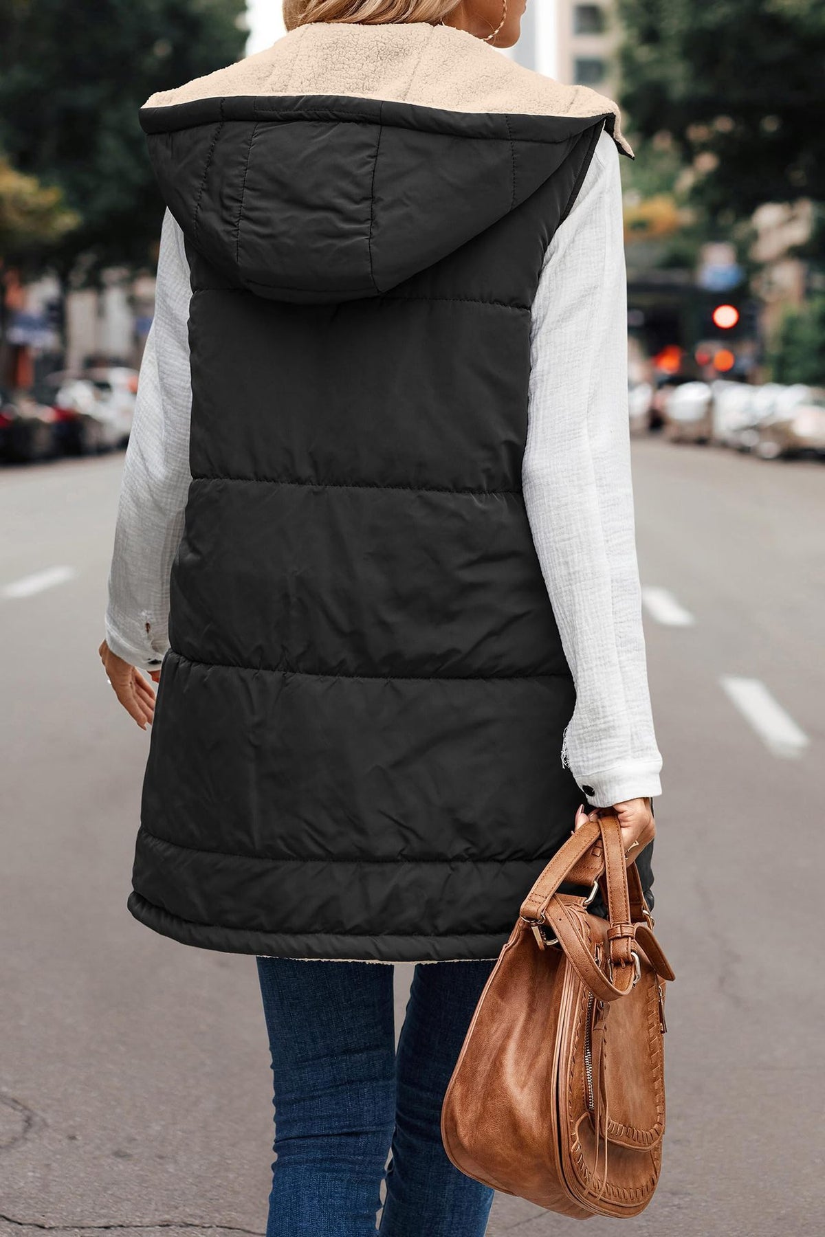 Margo & Main black sherpa lined vest — back view of the longline body with hood up, US women's sizes