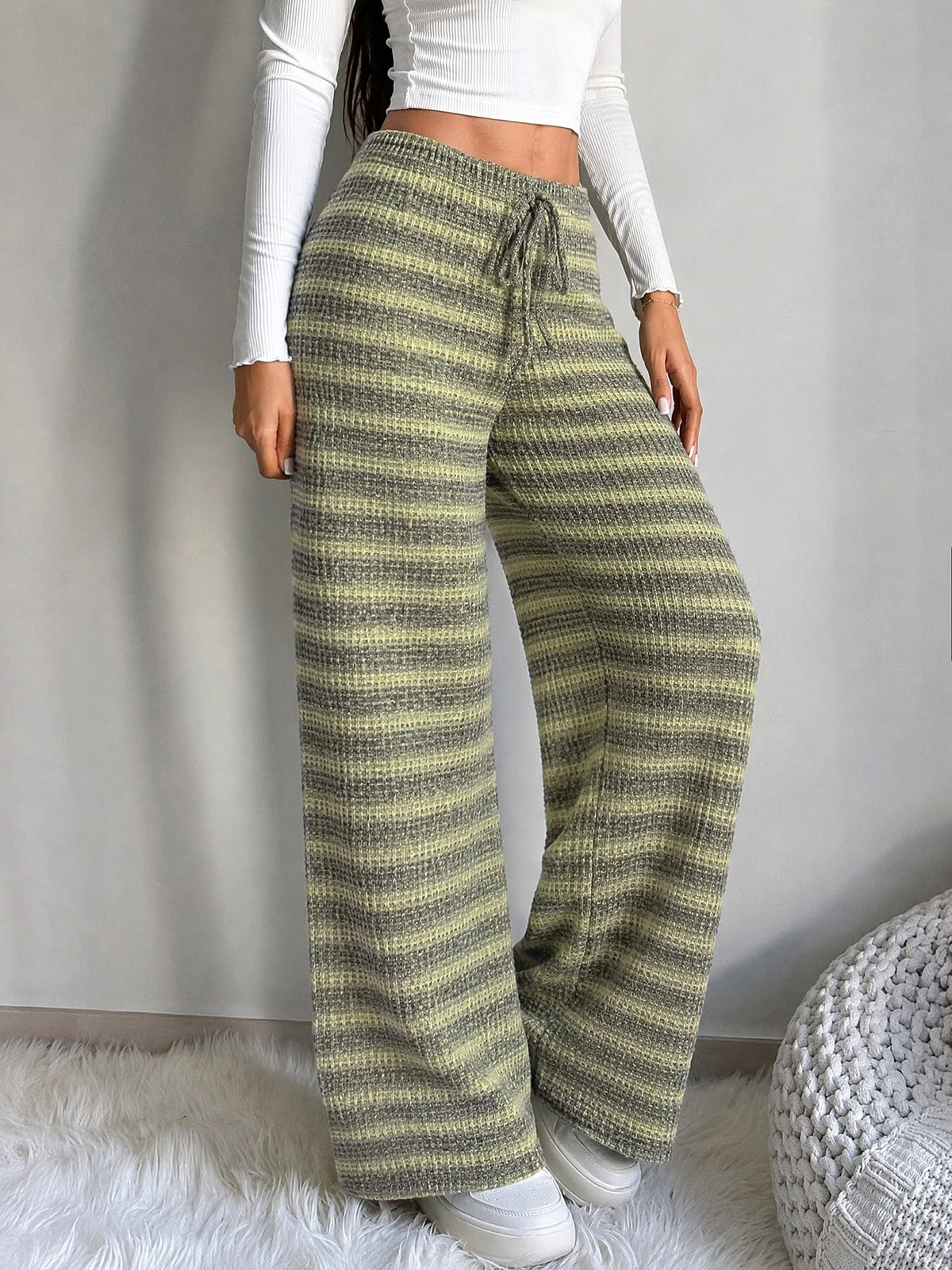 Margo & Main green striped knit wide-leg drawstring pants — angled view of the full wide leg, US women's sizes