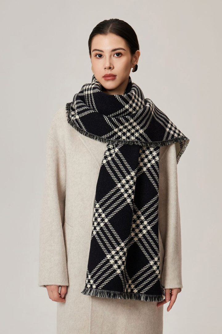 Margo & Main - black and cream plaid blanket scarf, front view over a cream coat, one size