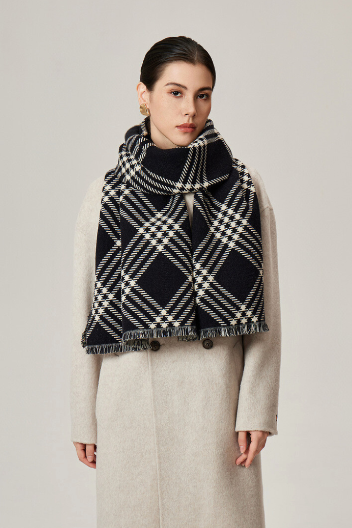 Margo & Main - black and cream plaid wrap worn over a full-length cream coat, one size