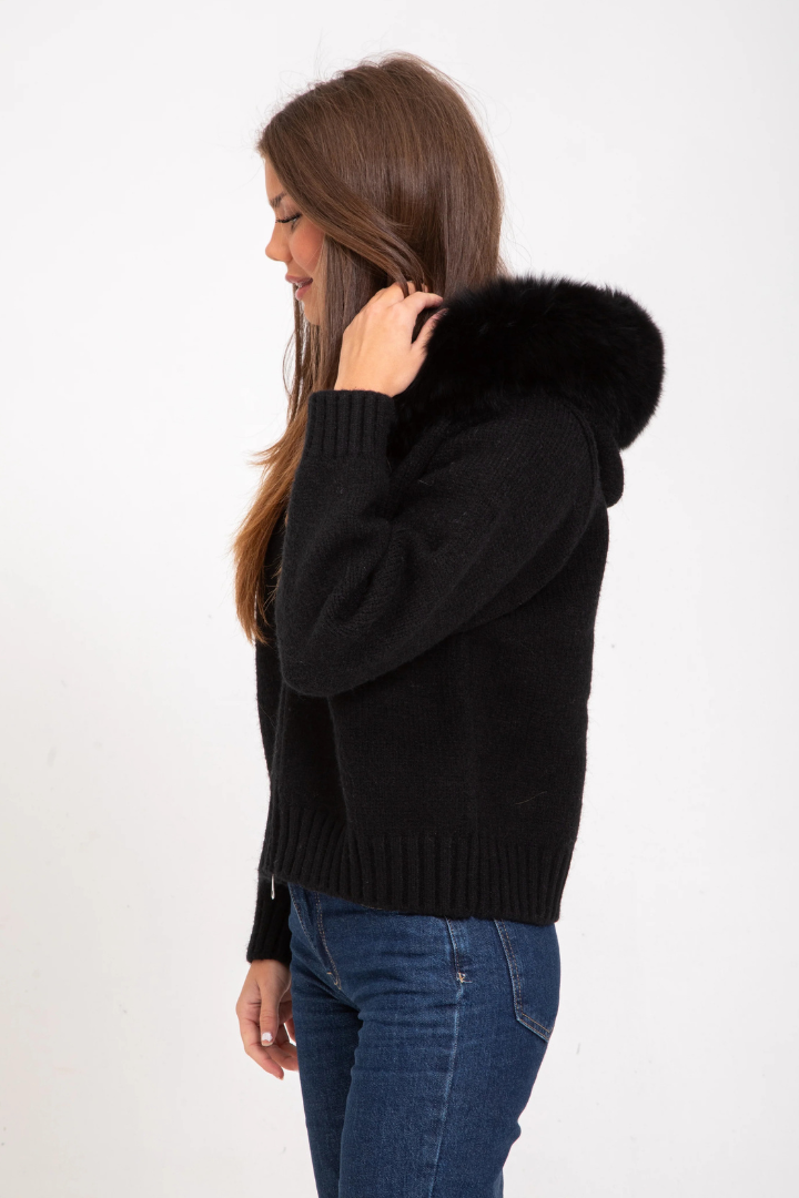 Margo & Main – black knit bomber jacket side view with the fur hood up, US women's sizes