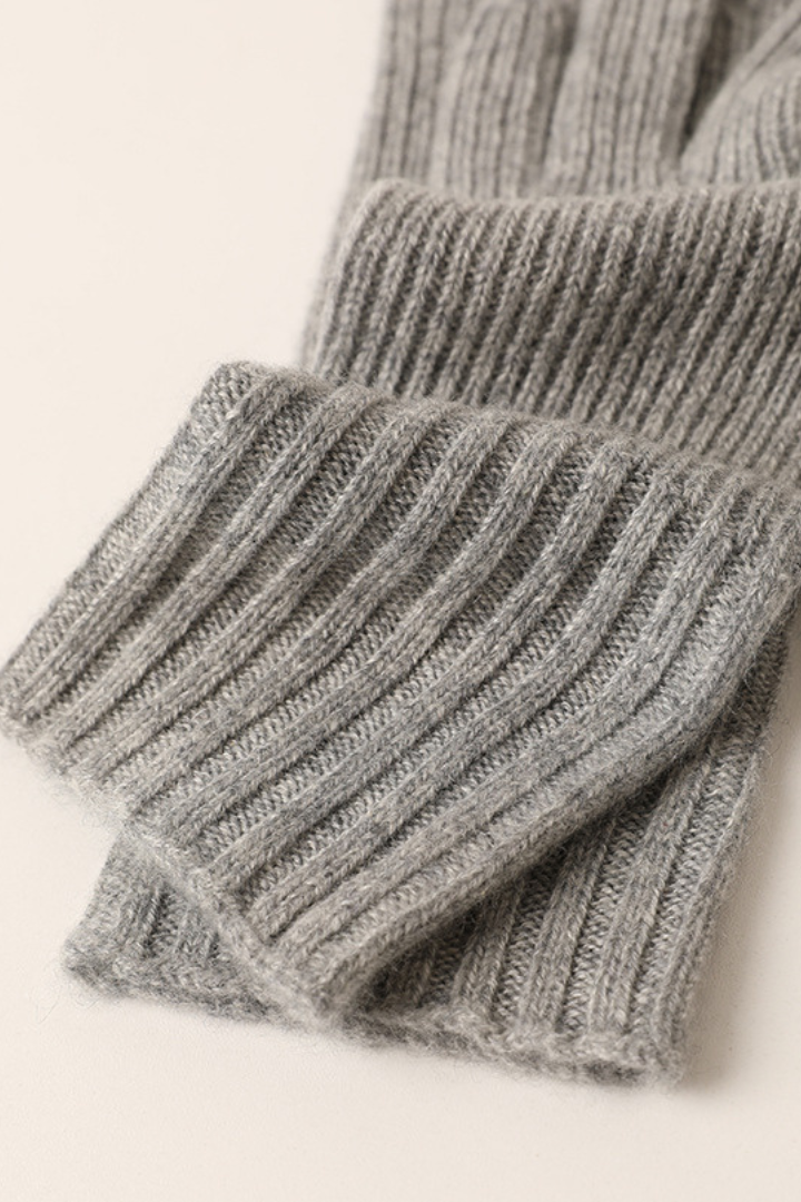 Margo & Main - gray cashmere gloves laid flat with both ribbed cuffs shown, one size