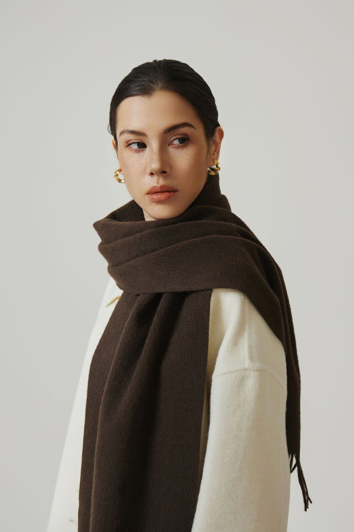 Margo & Main - chocolate brown lamb wool scarf, side view wrapped over a cream coat, one size