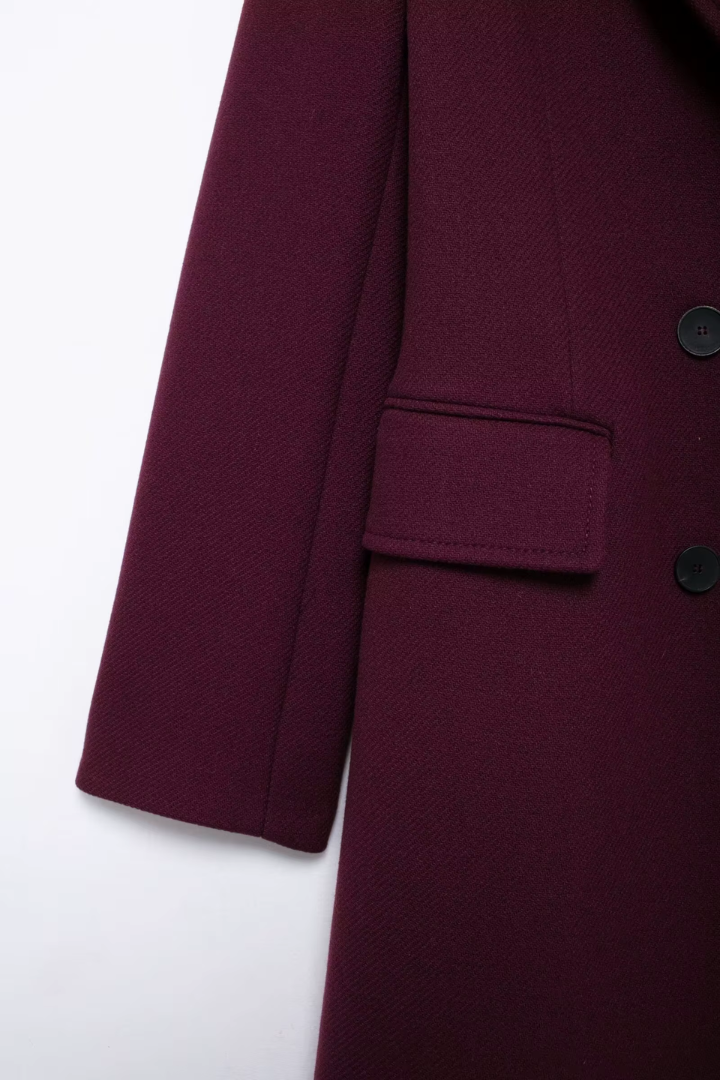 Margo & Main – Esme burgundy wool coat, close-up of sleeve and welt flap pocket, US women's sizes