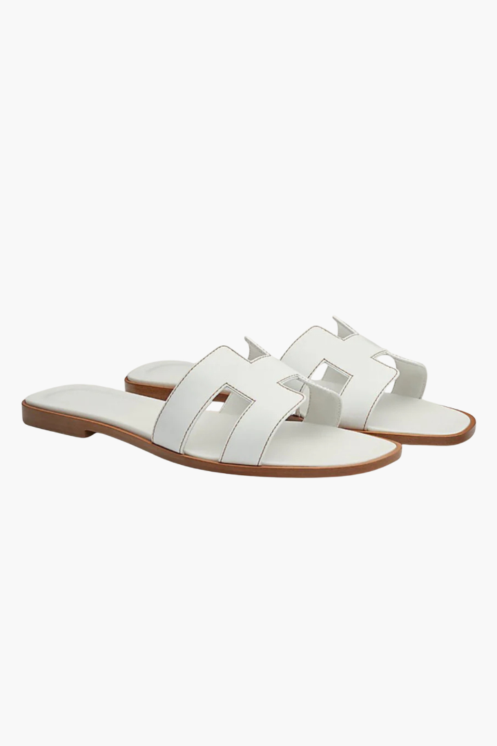 Margo & Main – white flat cutout leather slide sandals side profile view, US women's sizes