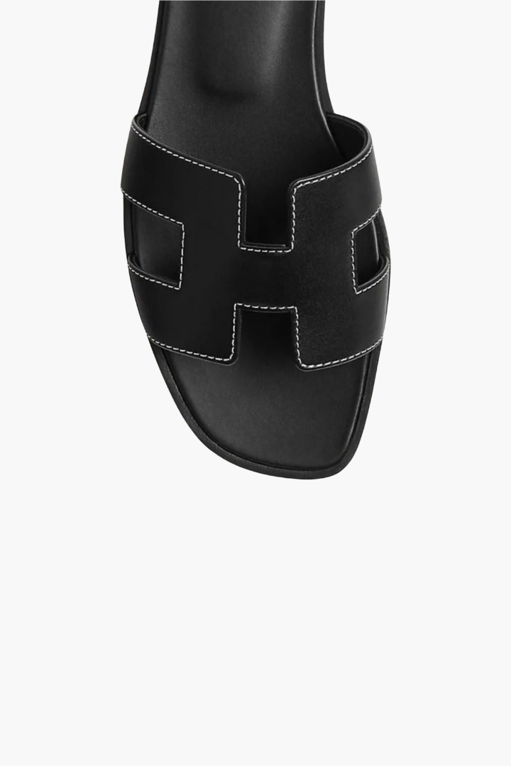 Margo & Main – flat cutout leather slide sandals, worn view, US women's sizes