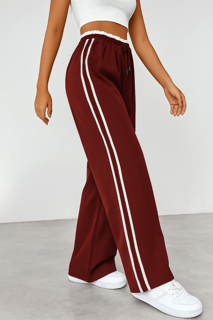 Margo & Main – Burgundy side-stripe pull-on trousers, walking side view, US women's sizes