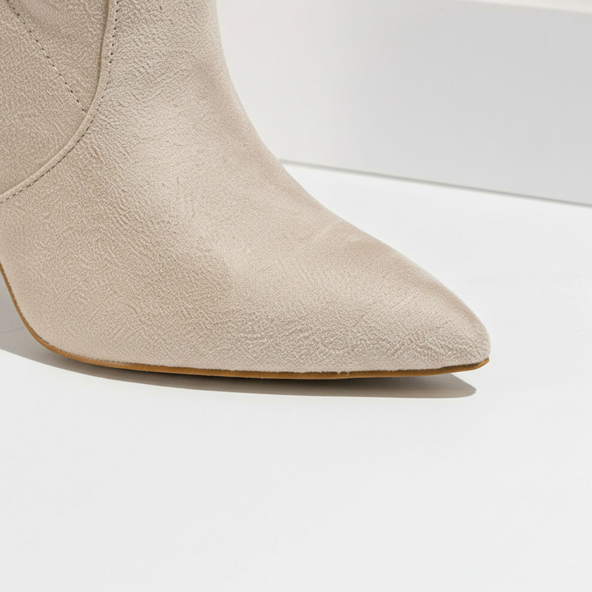 Margo & Main - beige knee-high boots, close-up of suede pointed toe, US women's sizes