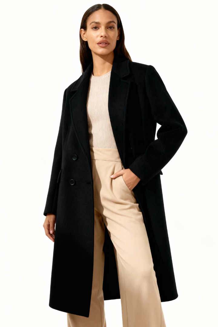 Margo & Main – Esme black double-breasted longline wool coat, full-length front view with hands in pockets, US women's sizes