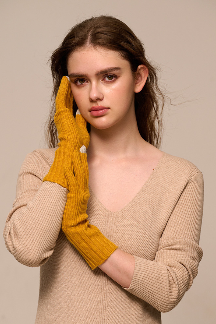 Margo & Main - mustard yellow cashmere gloves for women, front view worn on both hands, one size