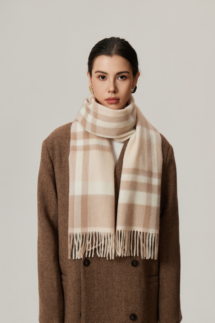 Margo & Main - sandstone checked wool scarf, close view of the fringed ends at the neck, one size