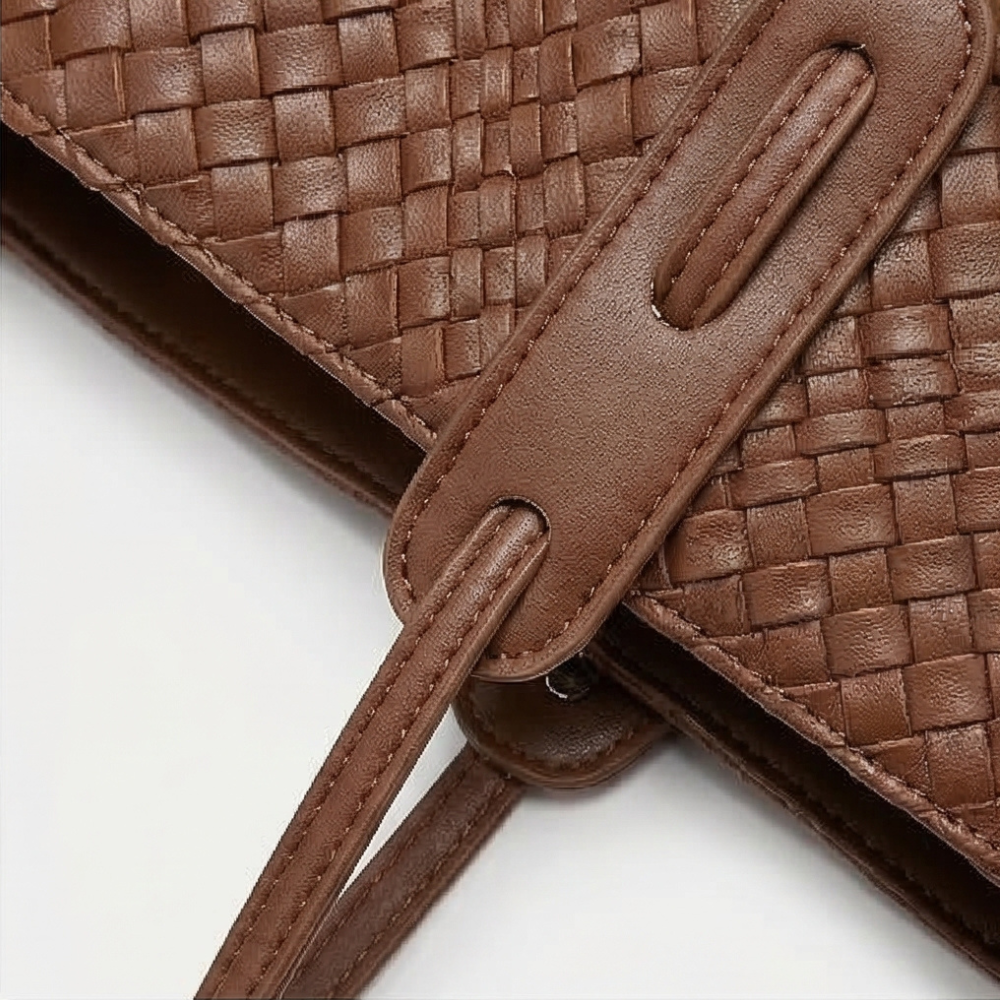 Margo & Main – Tessara brown woven tote, close-up of the strap keeper and woven panel