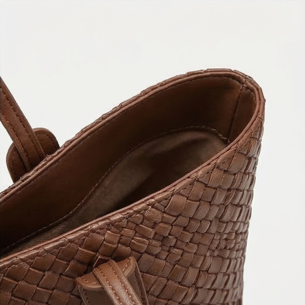 Margo & Main – Tessara brown woven tote, close-up of the top edge and interior lining