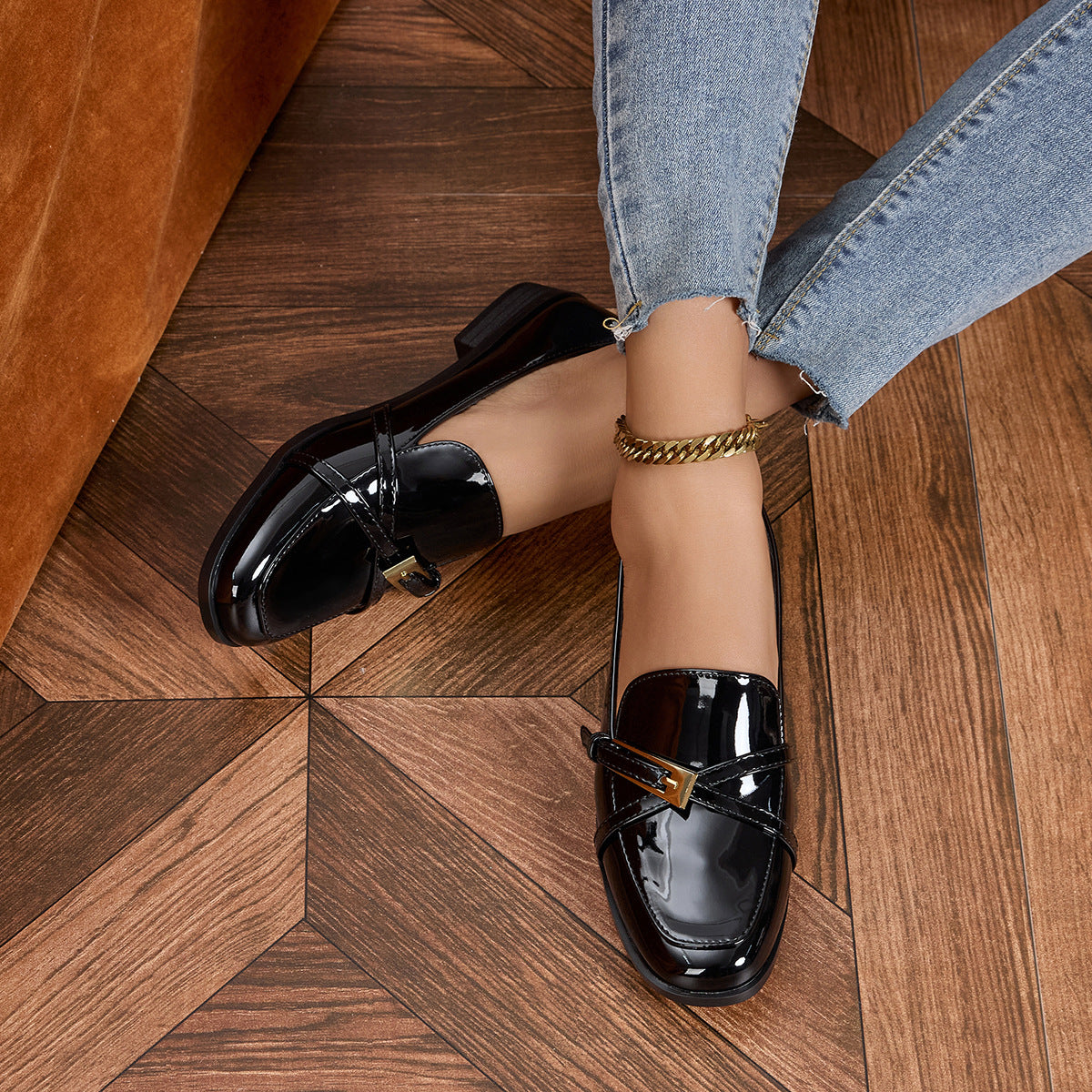 Margo & Main – Black Patent Square Toe Bar Loafers worn on a model, side view, US women's sizes