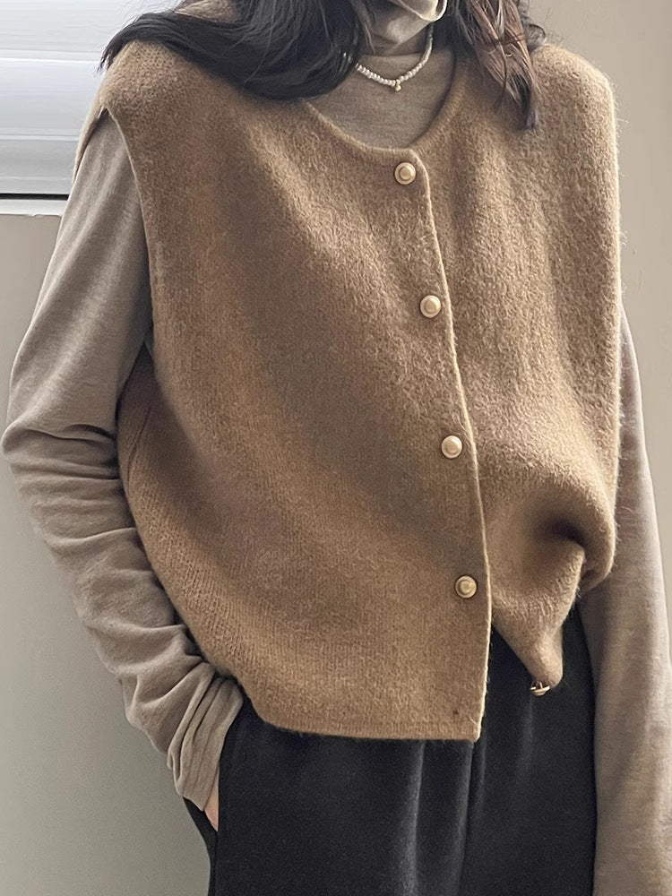 Margo & Main - tan knit sweater vest layered over a long sleeve top, US women's sizes