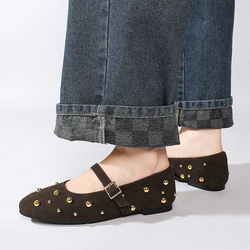 Margo & Main – dark brown studded flats worn with cuffed jeans, US women's sizes