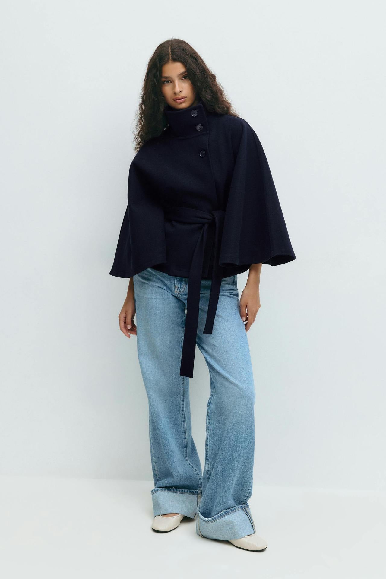 Margo & Main – Anneke navy button-front belted cape coat, full-length front view with wide-leg jeans, US women's sizes