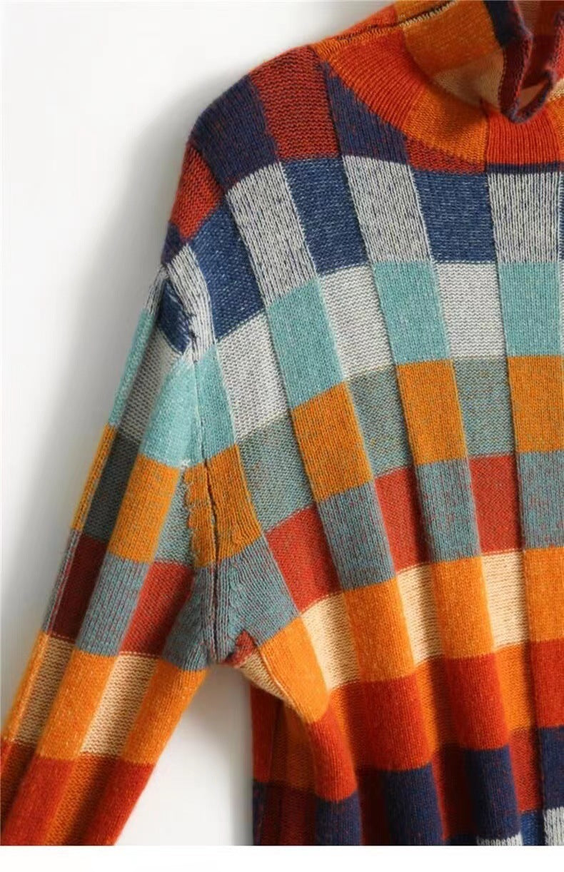 Margo & Main – Ravelyn patchwork check turtleneck sweater, shoulder and rolled neck close-up showing the orange, navy and teal squares, US women's sizes