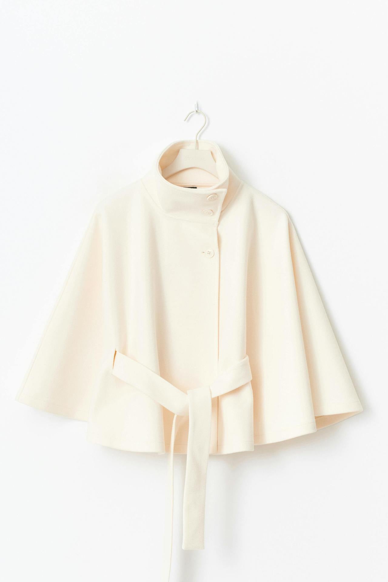 Margo & Main – Anneke ivory button-front belted cape coat, hanger product shot with the belt tied, US women's sizes