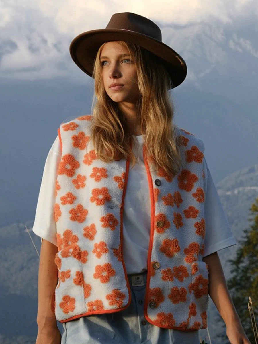 Margo & Main – ivory floral sherpa fleece vest worn open outdoors over a tee, US women's sizes
