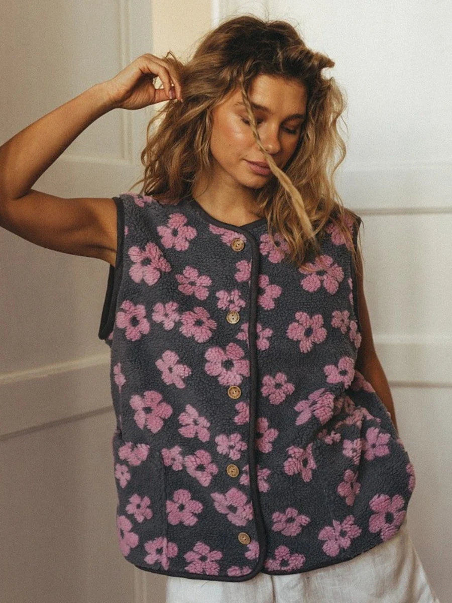 Margo & Main – pink floral sherpa fleece vest front view with the hands raised, US women's sizes