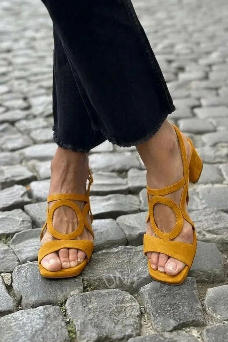 Margo & Main - mustard yellow ring-cutout block heel sandals worn outdoors, US women's sizes
