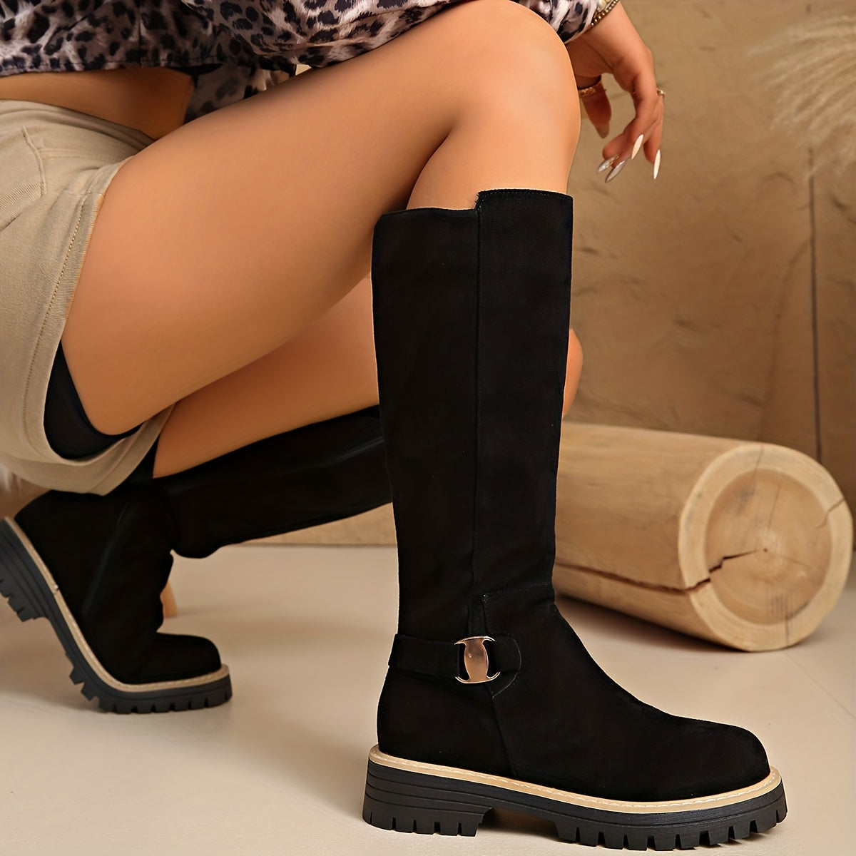 Margo & Main – black lug sole knee high boot side profile with buckle trim, US women’s sizes