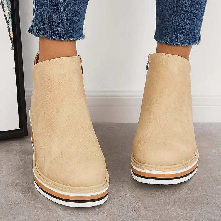 Margo & Main – Beige wedge ankle boots from behind, worn with cropped jeans, US women's sizes