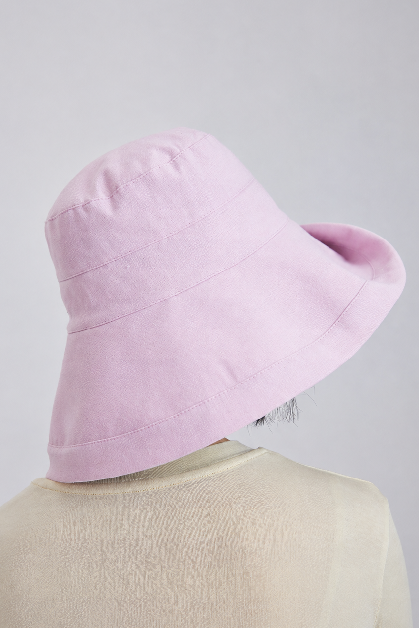 Margo & Main – Elke pink wide-brim bucket sun hat photographed from the back, showing the depth of the brim at the neck