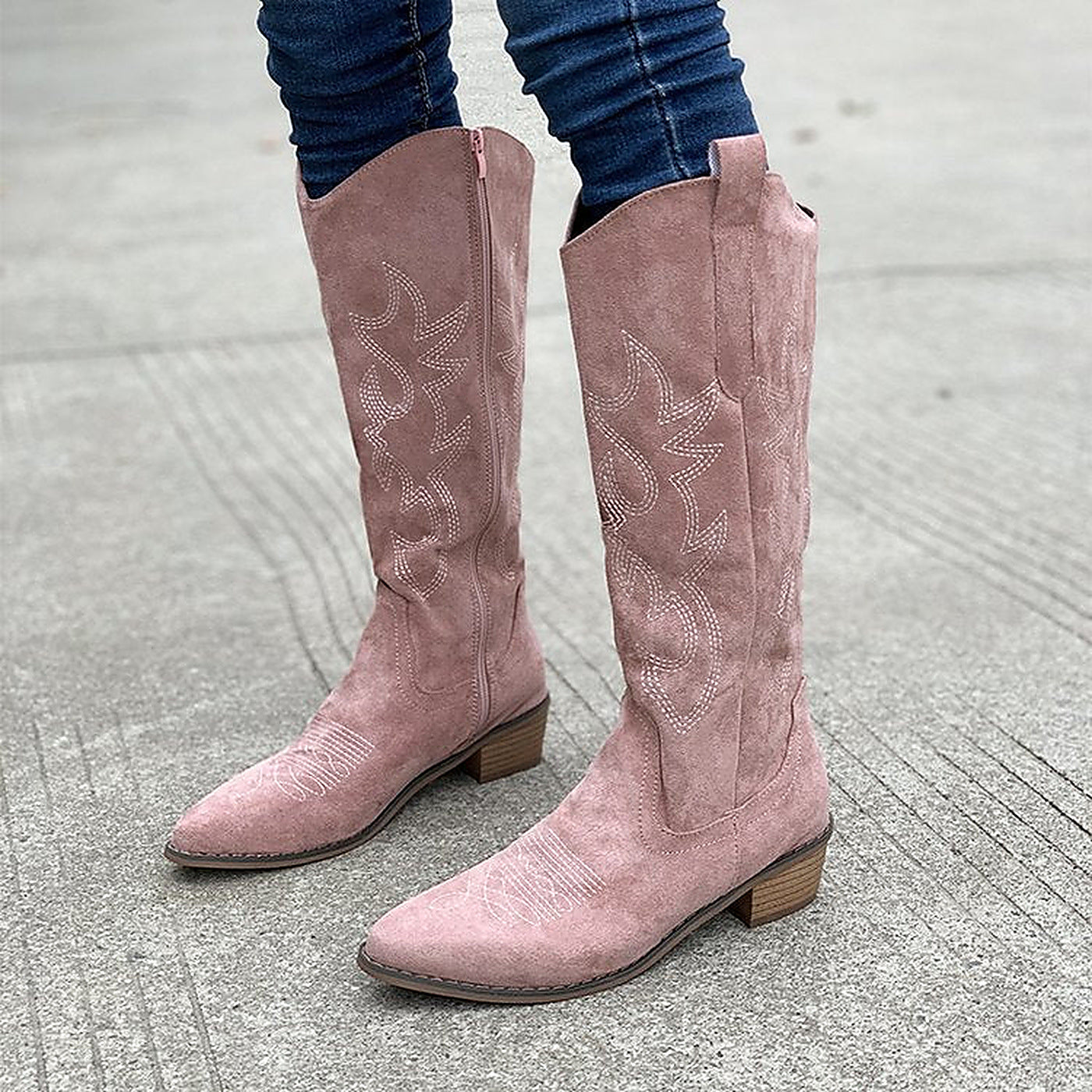 Margo & Main - pink suede western boots worn with jeans on pavement, US women's sizes