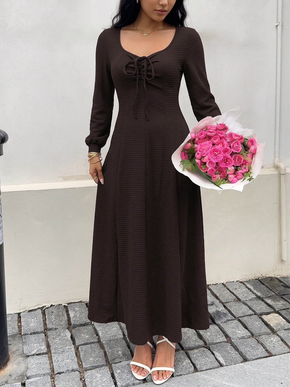 Margo & Main chocolate textured knit maxi dress — long sleeves and A-line skirt with bouquet