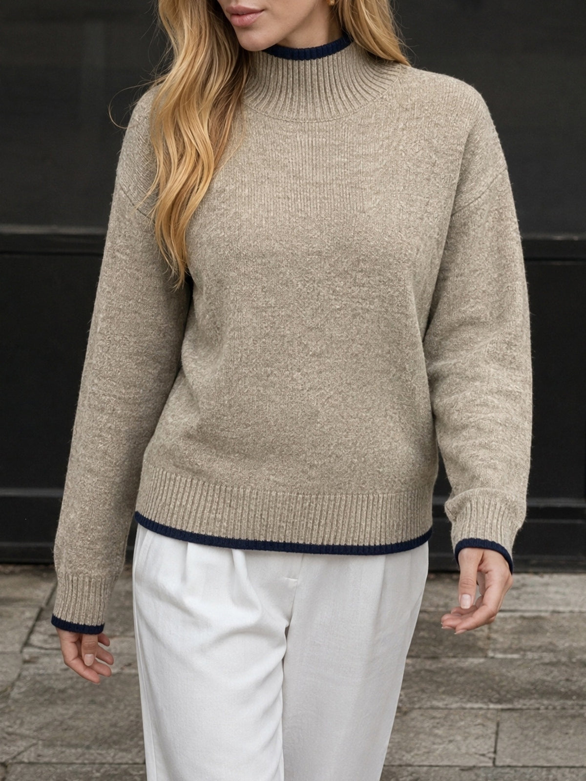 Margo & Main khaki contrast trim mock neck sweater — front view with navy trim and white pants