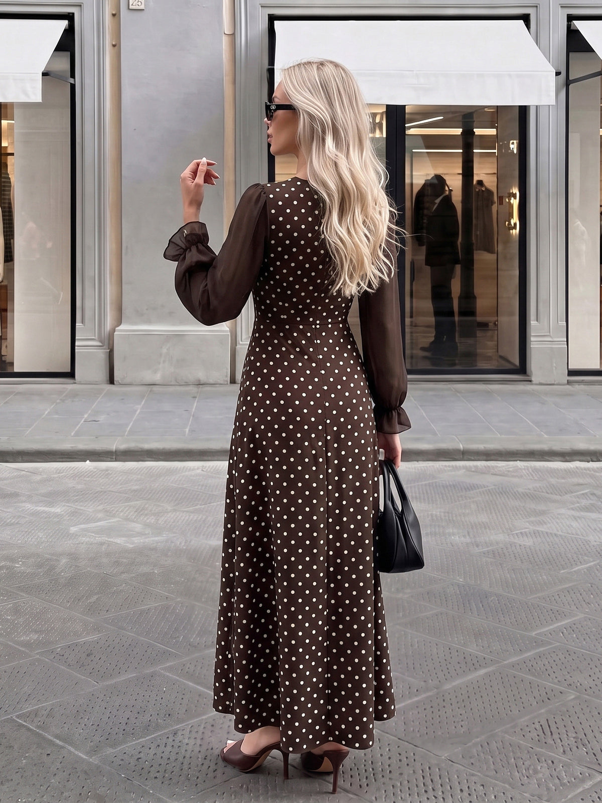 Margo & Main brown polka dot maxi dress — back view of the long sleeves and A-line skirt, US women's sizes