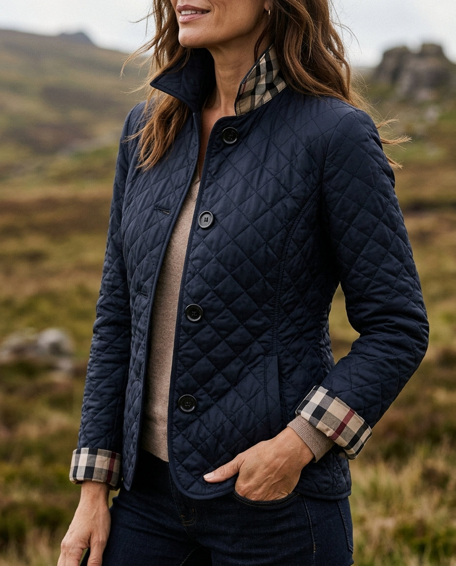 Margo & Main navy diamond quilted jacket — three-quarter view of the quilting and cuffs, US women's sizes