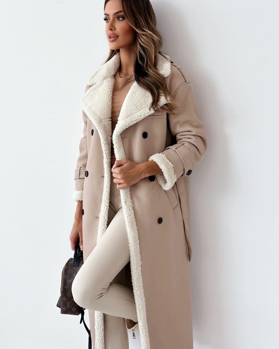 Margo & Main beige faux shearling coat — side view of the tie belt and wide lapels, US women's sizes