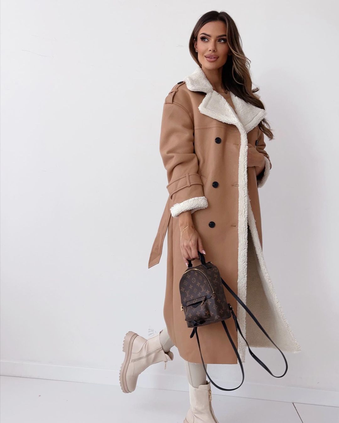 Margo & Main tan faux shearling coat — full-length view of the belted longline cut, US women's sizes