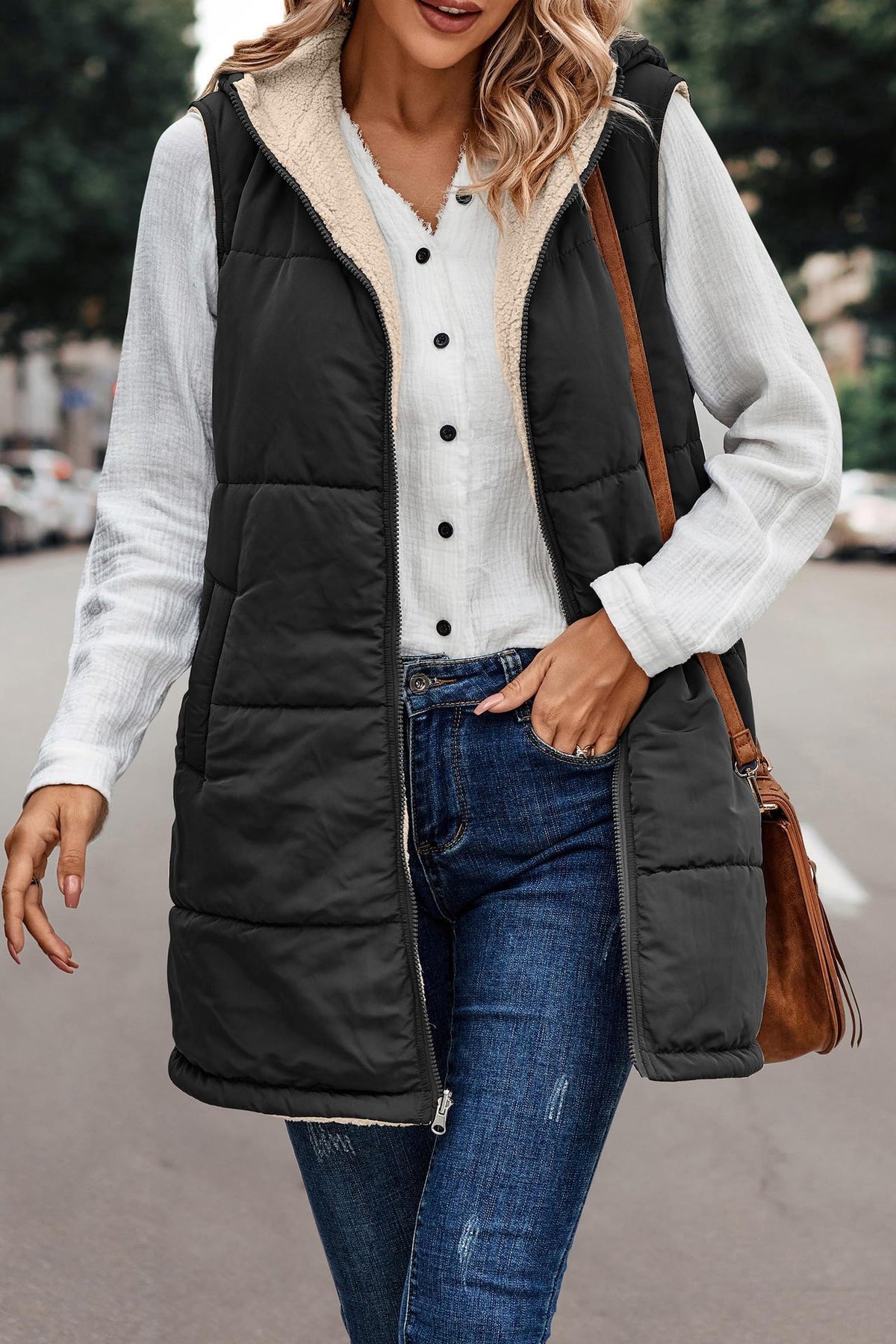 Margo & Main black sherpa lined vest — three-quarter view with the plush lining showing, US women's sizes