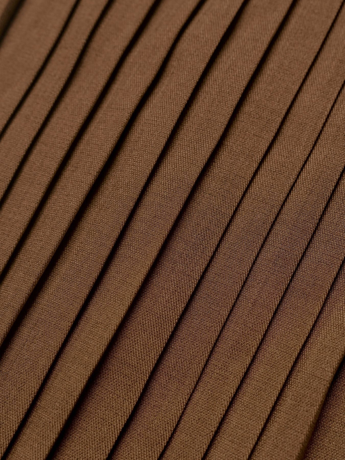 Margo & Main chocolate velvet midi dress — close-up of the knife pleats on the midi skirt