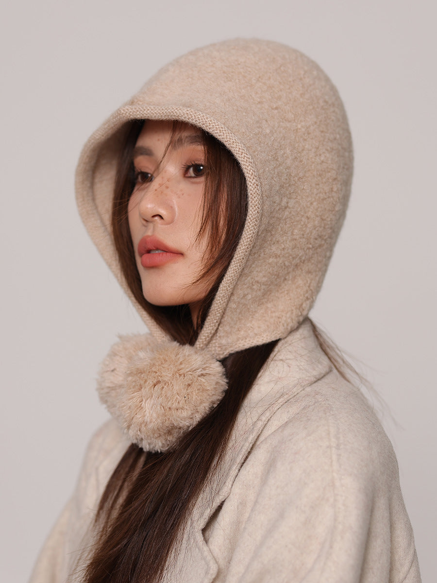 Margo & Main cream wool pom pom hood — side view of the hood and the soft pom pom ends
