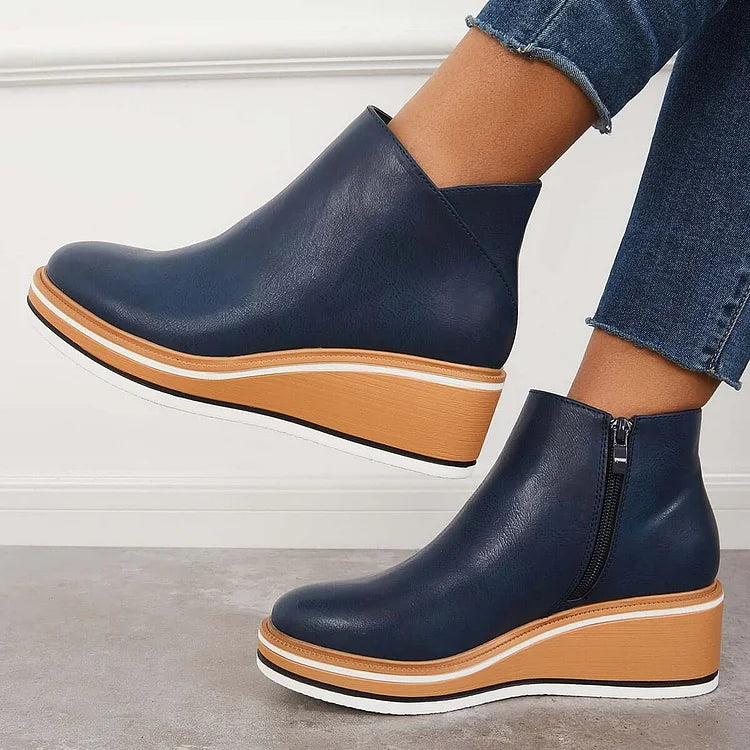 Margo & Main – Navy wedge ankle boots, profile view of the platform wedge, US women's sizes